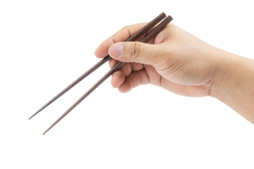 Right asian Hand holding wooden chopsticks isolated on white background.picking or selecting object something