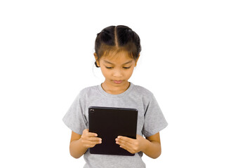 Little girl playing with a digital tablet