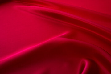 Naklejka na ściany i meble Close up of dark red silk background