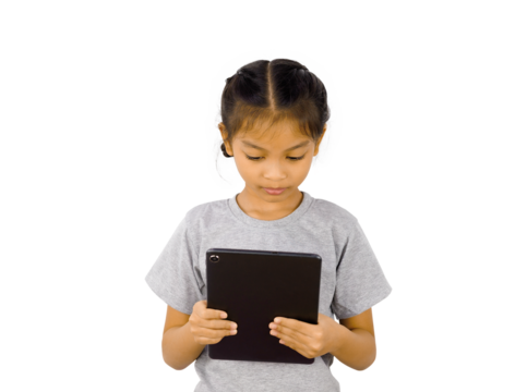 Little girl playing with a digital tablet