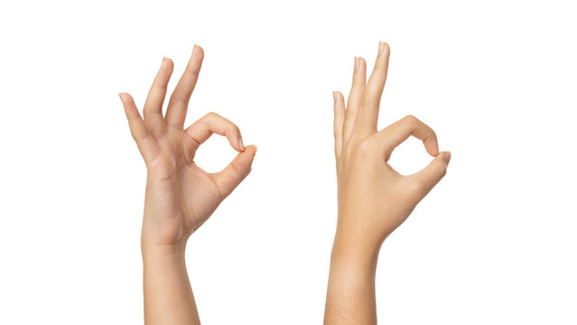 Woman hand ok sign on a white isolated background with clipping path