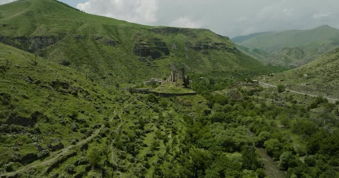 Ancient Heritage-listed Khertvisi Fortress By The Paravani River In Aspindza, Meskheti, Georgia. aerial pullback