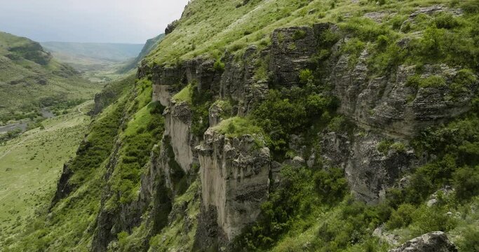 Steep Rock Walls On Towering Cliffs Near Khertvisi Fortress In Aspindza, Southern Georgia. Aerial Drone Shot