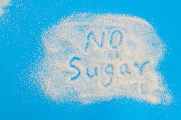 Text no sugar written on granulated sugar - Powered by Adobe
