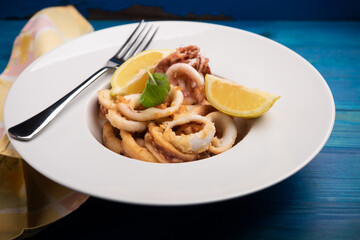 Deep fried calamari rings on a dish