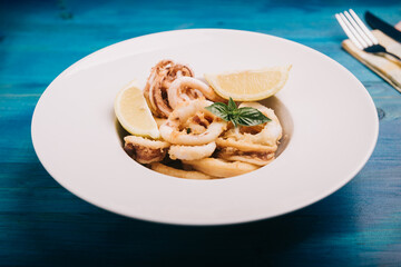 Deep fried calamari rings on a dish