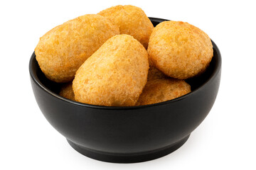 Fried breaded chilli cheese nuggets in a black ceramic bowl isolated on white.