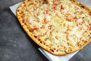 Flammkuchen savory pie bacon, onion, sour cream pastrie meal food snack on the table copy space food background