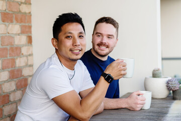 gay couple having a coffee