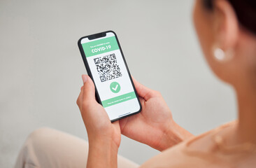 Covid vaccine passport, digital certificate and immunity travel pass displayed with qr code on phone screen for health clearance. Woman, tourist and traveler with mobile app for medical vaccination