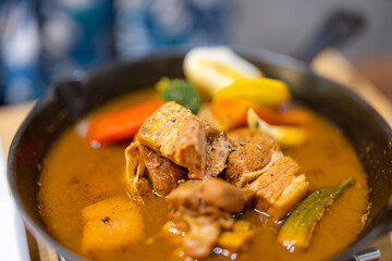Pork curry bowl soup in restaurant