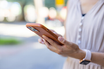 Woman use of mobile phone at outdoor
