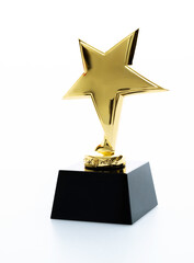 Golden star trophy on white background
