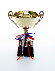 Golden trophy with ribbon on white background