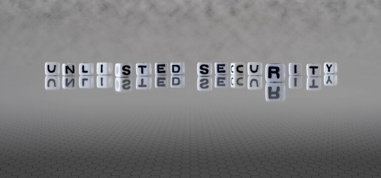 unlisted security word or concept represented by black and white letter cubes on a grey horizon background stretching to infinity