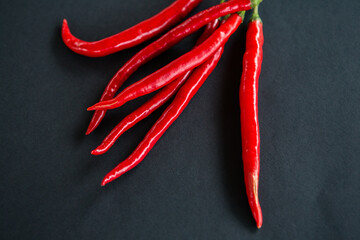 Red Chili Pepper Isolated On Black Background