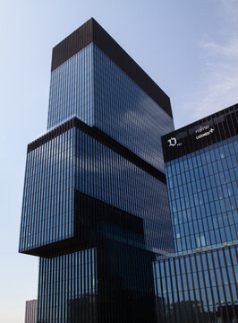.KTW office buildings complex at Roździeńskiego Avenue. Skyscraper towers next to Spodek sports and entertainment hall on July 21, 2022 in Katowice, Poland.