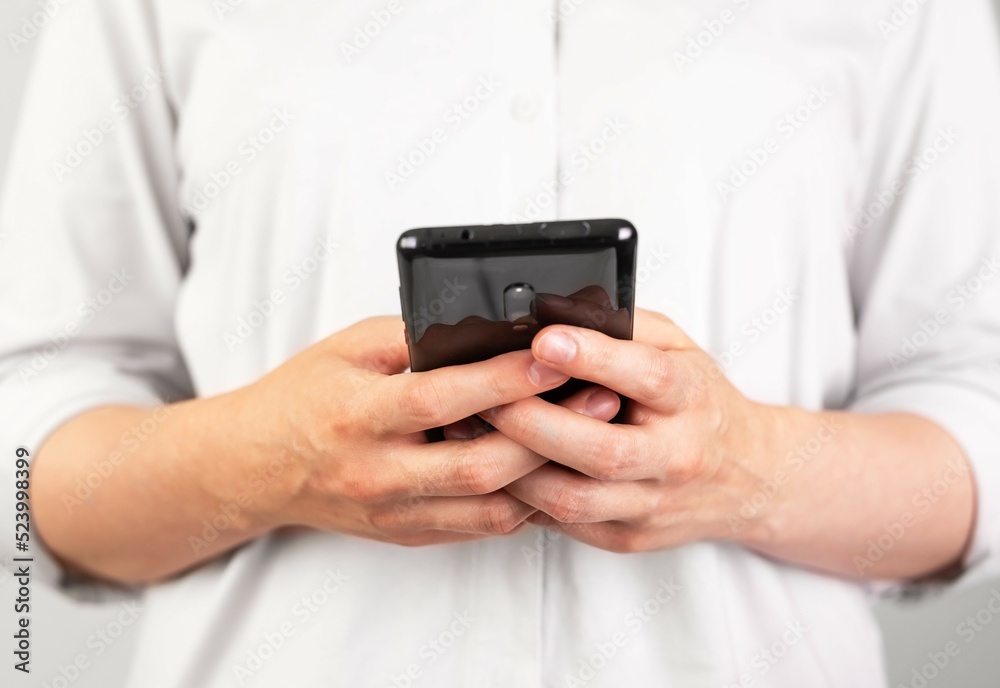 Poster woman hands texting message at phone. female using android for instant messaging, sharing photos, vi