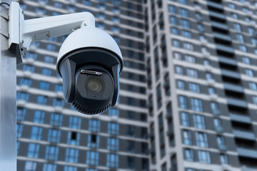 CCTV monitoring, security cameras. Backdrop with views of condominium