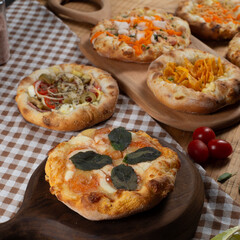 Sfiha on a wooden table with ingredients