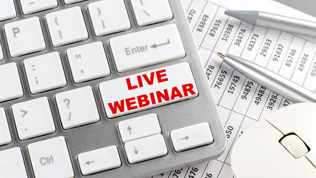 LIVE WEBINAR text on a keyboard wirh chart and pencil