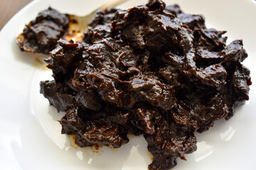 Tamarind on a white plate. 