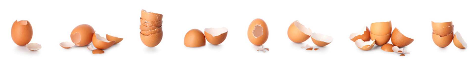 Set of broken egg shells on white background