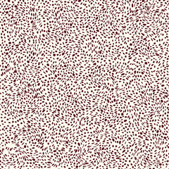 Abstract vector seamless pattern of dark dots on white background.