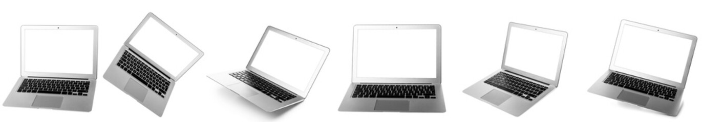 Set of modern laptops isolated on white