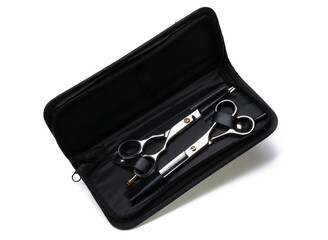 Scissors for cutting and thinning hair.
A set of professional hairdressing scissors in a black case. Isolated on white background