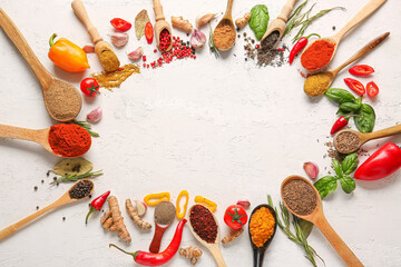 Frame made of fresh aromatic spices and vegetables on light background