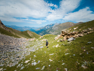 Photograph of the ascent to Pico Escuelas in the town of Panticosa, in the Pyrenees of Aragon, a high mountain landscape perfect for trekking.