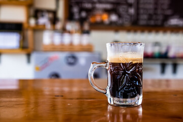 Americano coffee or black coffee glass in coffee shop cafe.