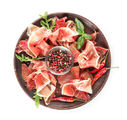 Wooden plate with delicious jamon and spices on white background