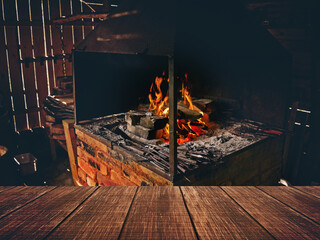 Desk of free space and workshop. Interior of an old forge. Bright fire burning in the furnace.