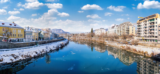 Fototapeta premium Cityscape of the small austrian city of Villach and the Drau river, Carinthia, Austria