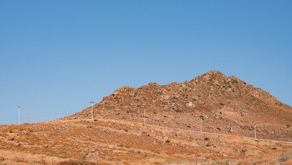 Fototapeta premium mountain landscape and electricity poles background