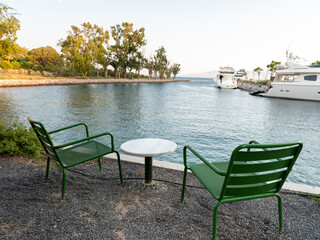 empty marble table in front of marina background, Aspat Marina, Bodrum, Turkey