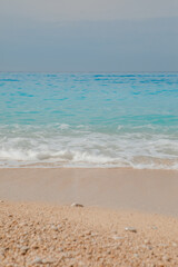Fototapeta na wymiar sea beach with white rocks and blue water