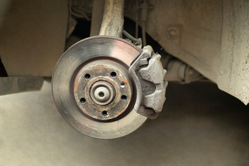 Wheel disk of car. Replacement of wheel in transport. Machine parts.
