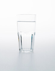 A glass of water on white background