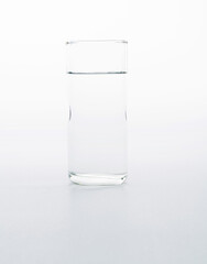 A glass of water on white background