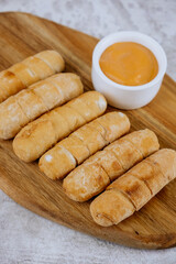 Fried tequeños, fingers stuffed with salty artisanal cheese, typical Venezuelan and Latin American food