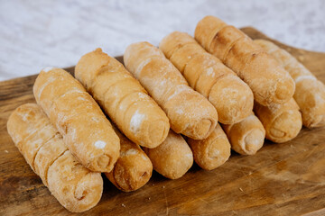 Fried tequeños, fingers stuffed with salty artisanal cheese, typical Venezuelan and Latin American food
