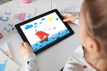 Little girl holding tablet with cute drawing at home. Child art - obrazy, fototapety, plakaty