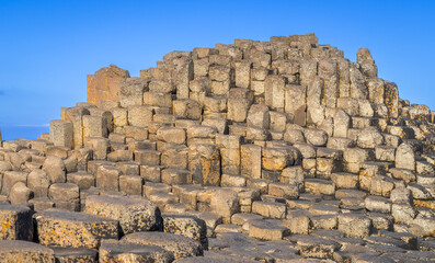 Beautiful Exposure of Giant's Causeway UNESCO World Heritage Site, is an area of about 40,000 interlocking hexagonal basalt columns, the result of an ancient volcanic fissure eruption. It is located i