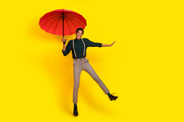 Photo of carefree butch short hair lady guy jump parasol wear fashion stylish trendy unisex shirt...