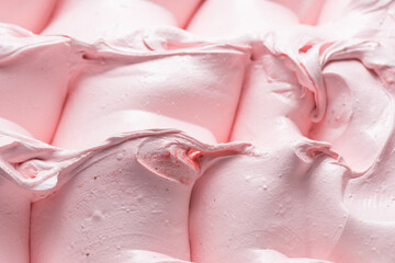 Frozen Strawberry flavour gelato - full frame detail. Close up of a pink surface texture of Ice cream.