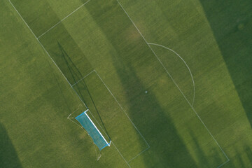 Aerial view of the centre of a grass soccer field.