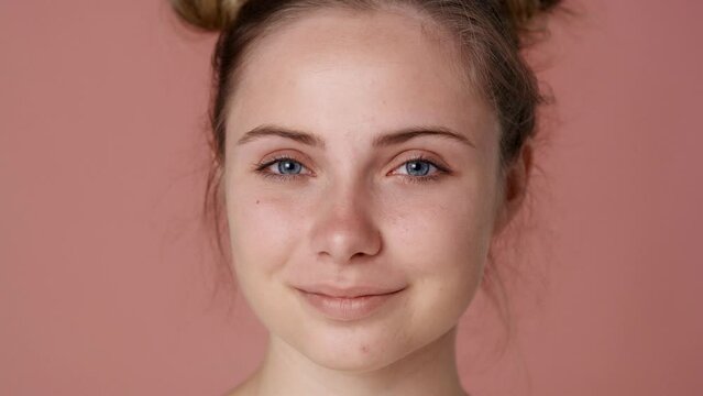 Close up portrait of smiling caucasian teenage woman. Shot with RED helium camera in 8K.    